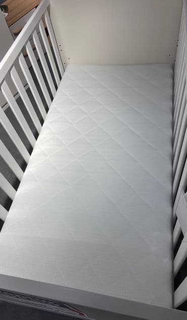 Babybett-Matratze - Hintergrundbild